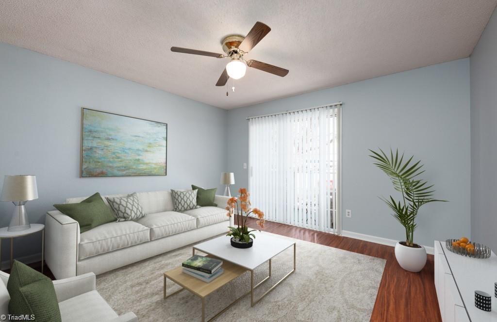 5515 Hornaday Road, Unit D Greensboro, NC 27409 - Photo 4 of 12 living room, virtually staged