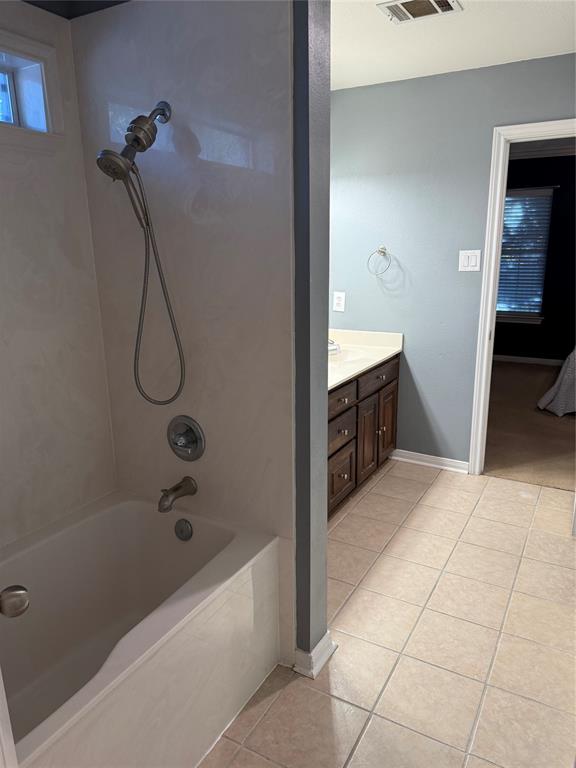921 Cloud Croft Drive Hewitt, TX 76643 - Photo 14 of 18 a bathroom with a bathtub and a shower
