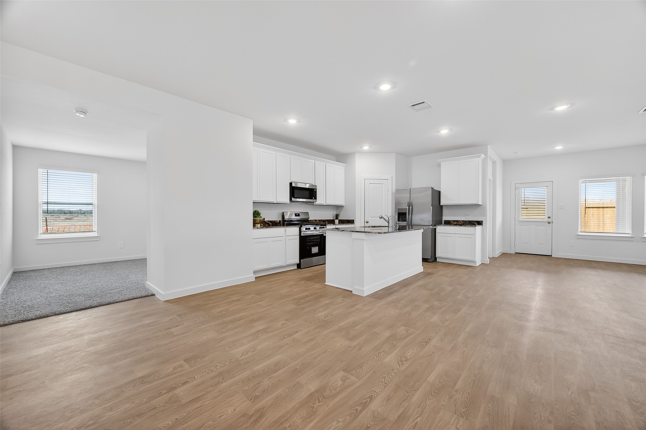 5927 Orchid Crst Lane Rosenberg, TX 77469 - Photo 5 of 40 Open Concept Kitchen, Family and dining area