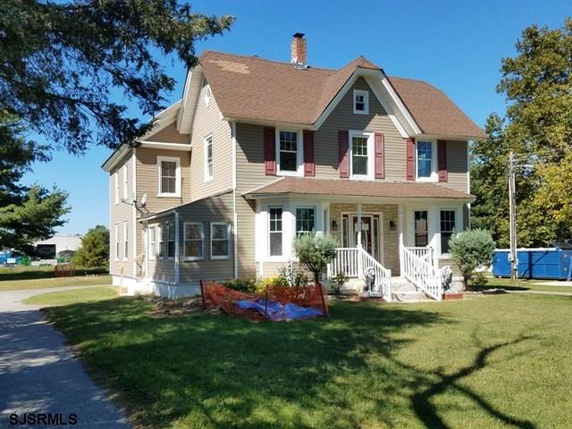135 Middle Road Hammonton, NJ 08037 - Photo 1 of 1 a front view of a house with garden and porch