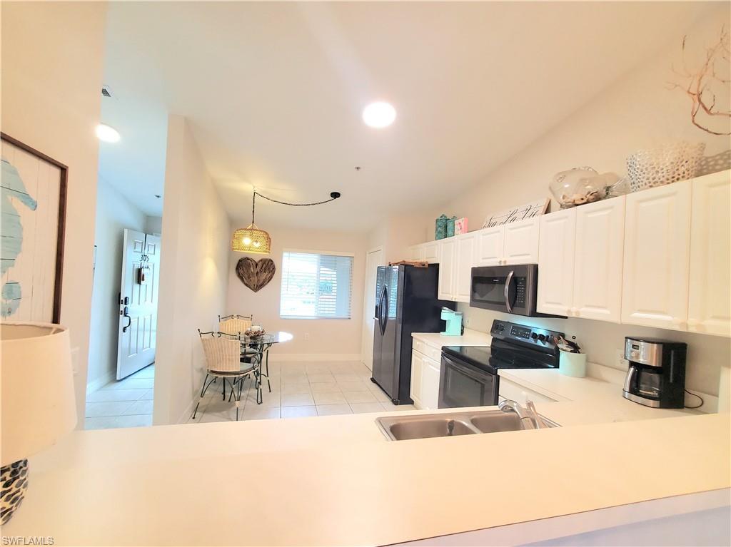 1100 Eastham Way, Unit A305 Naples, FL 34104 - Photo 16 of 49