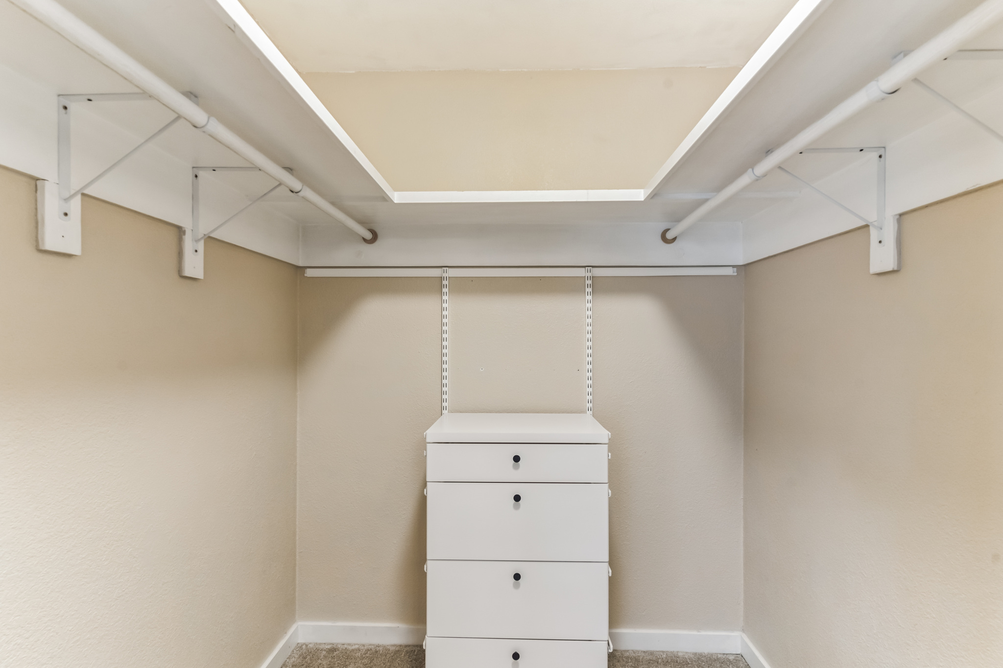 3214 Clawson Road, Unit A Austin, TX 78704 - Photo 15 of 26 Well-appointed walk-in closet with integrated shelving and convenient drawer storage.