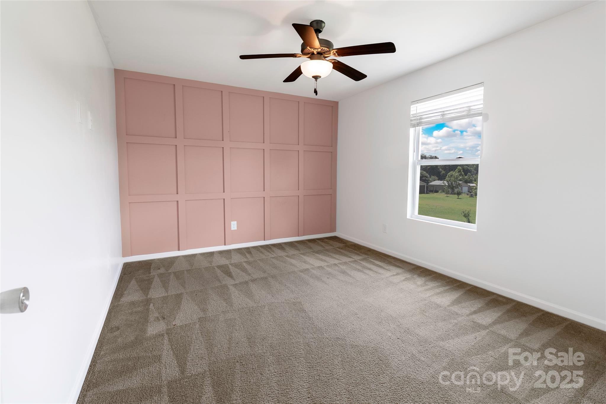 556 Big Lick Road Stanfield, NC 28163 - Photo 13 of 19 a view of an empty room and window