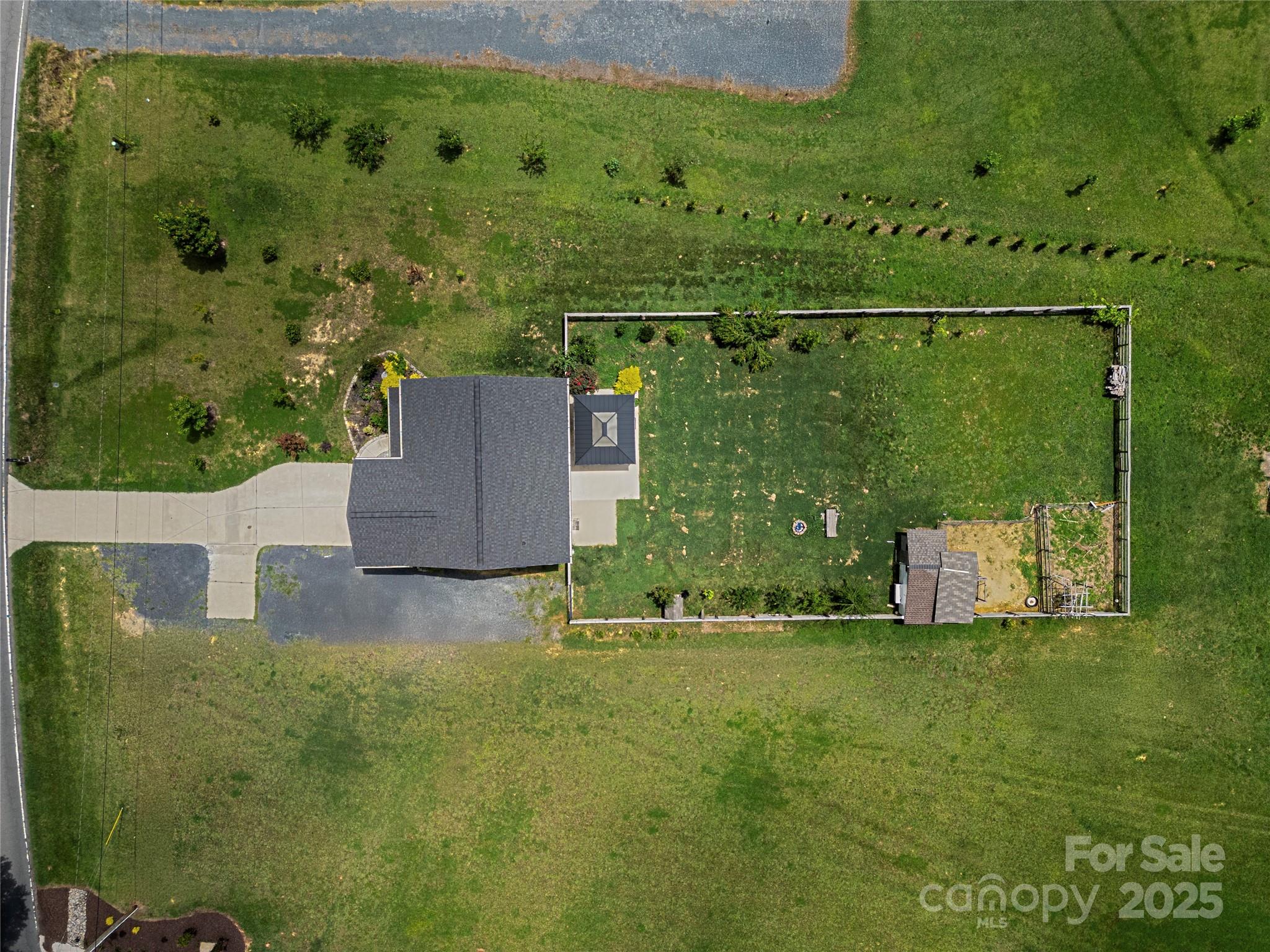 556 Big Lick Road Stanfield, NC 28163 - Photo 16 of 19 an aerial view of a house with a yard