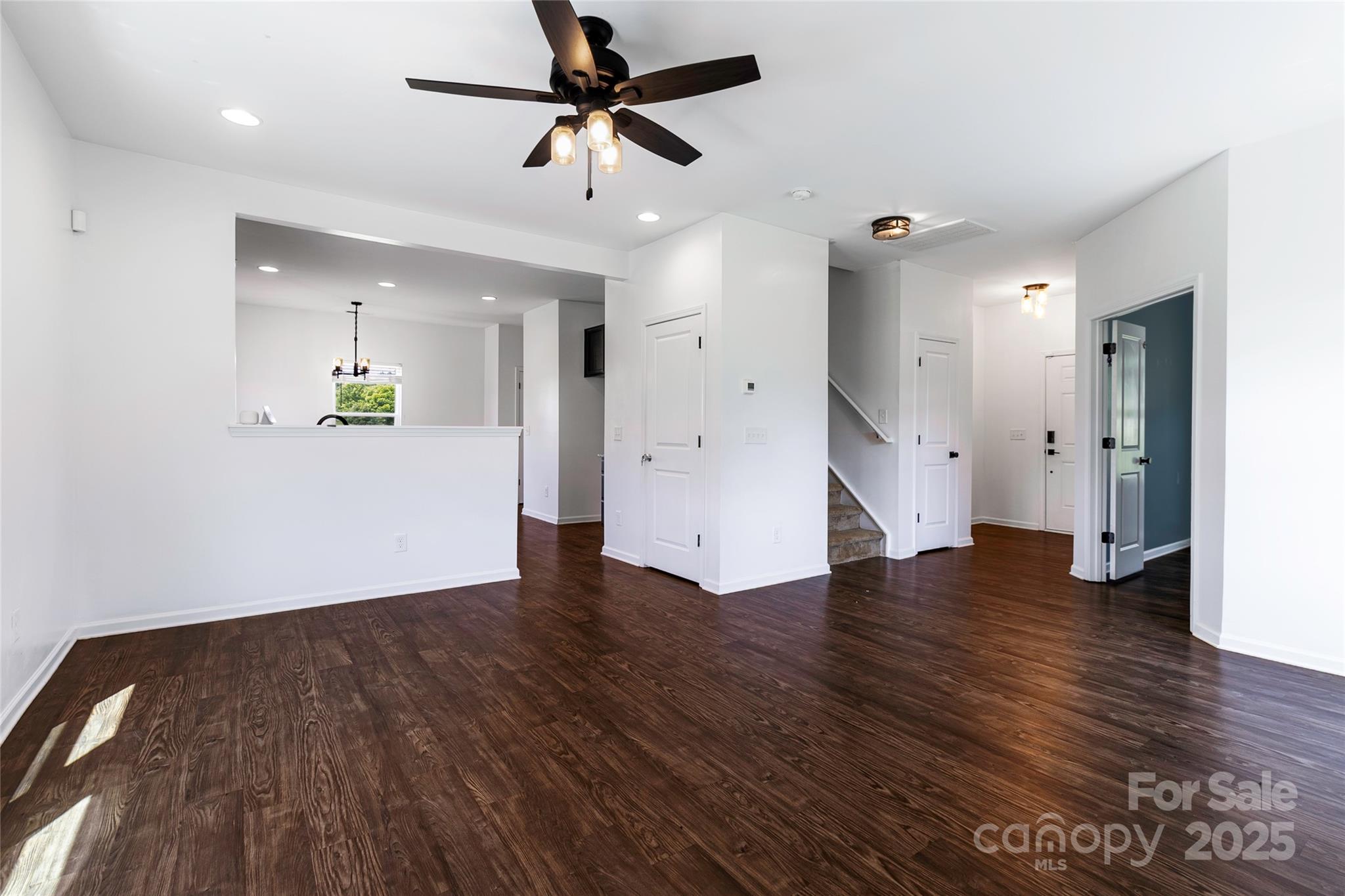 556 Big Lick Road Stanfield, NC 28163 - Photo 5 of 19 wooden floor in an empty room with a window