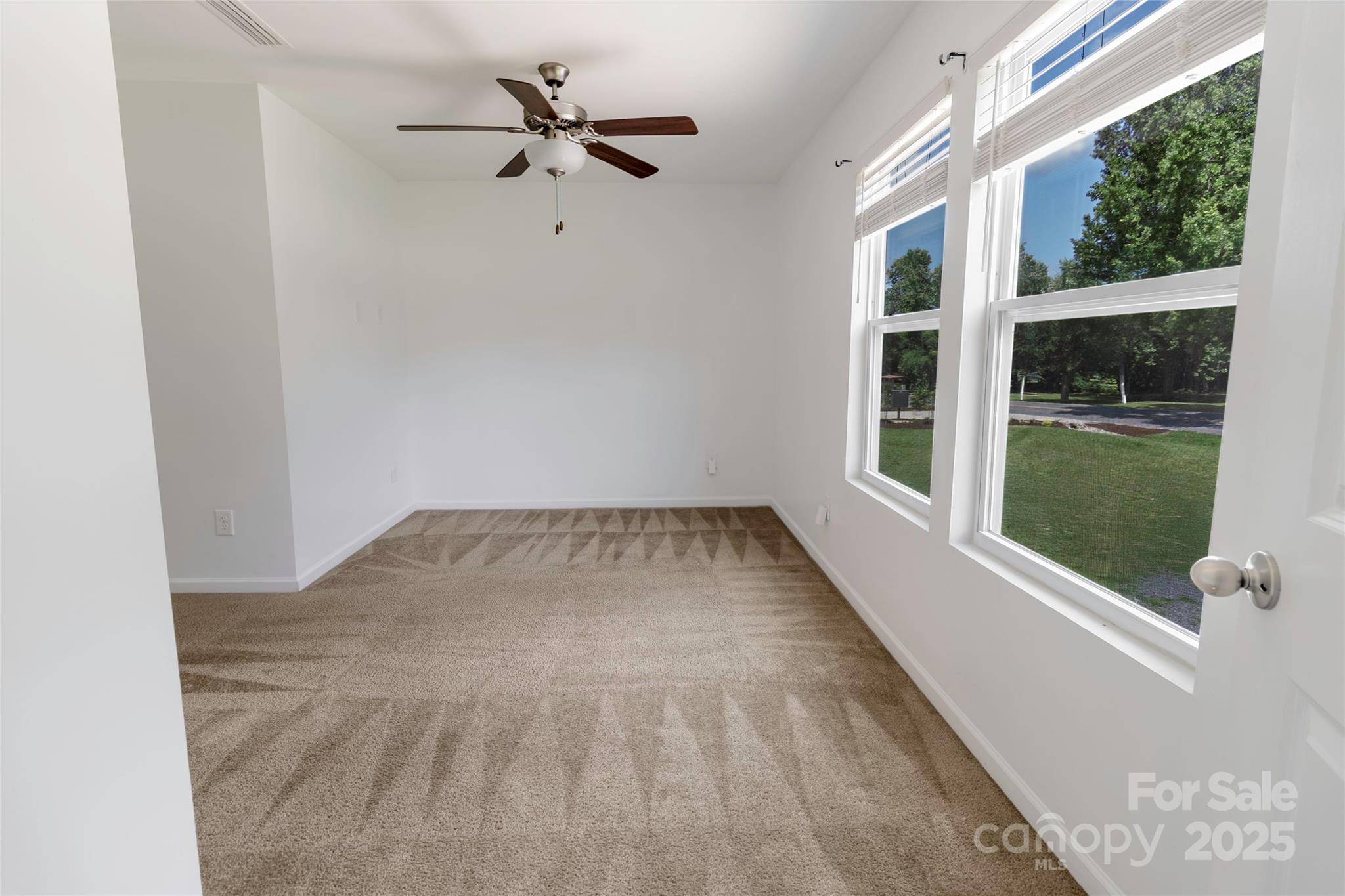 556 Big Lick Road Stanfield, NC 28163 - Photo 9 of 19 a view of empty room with windows