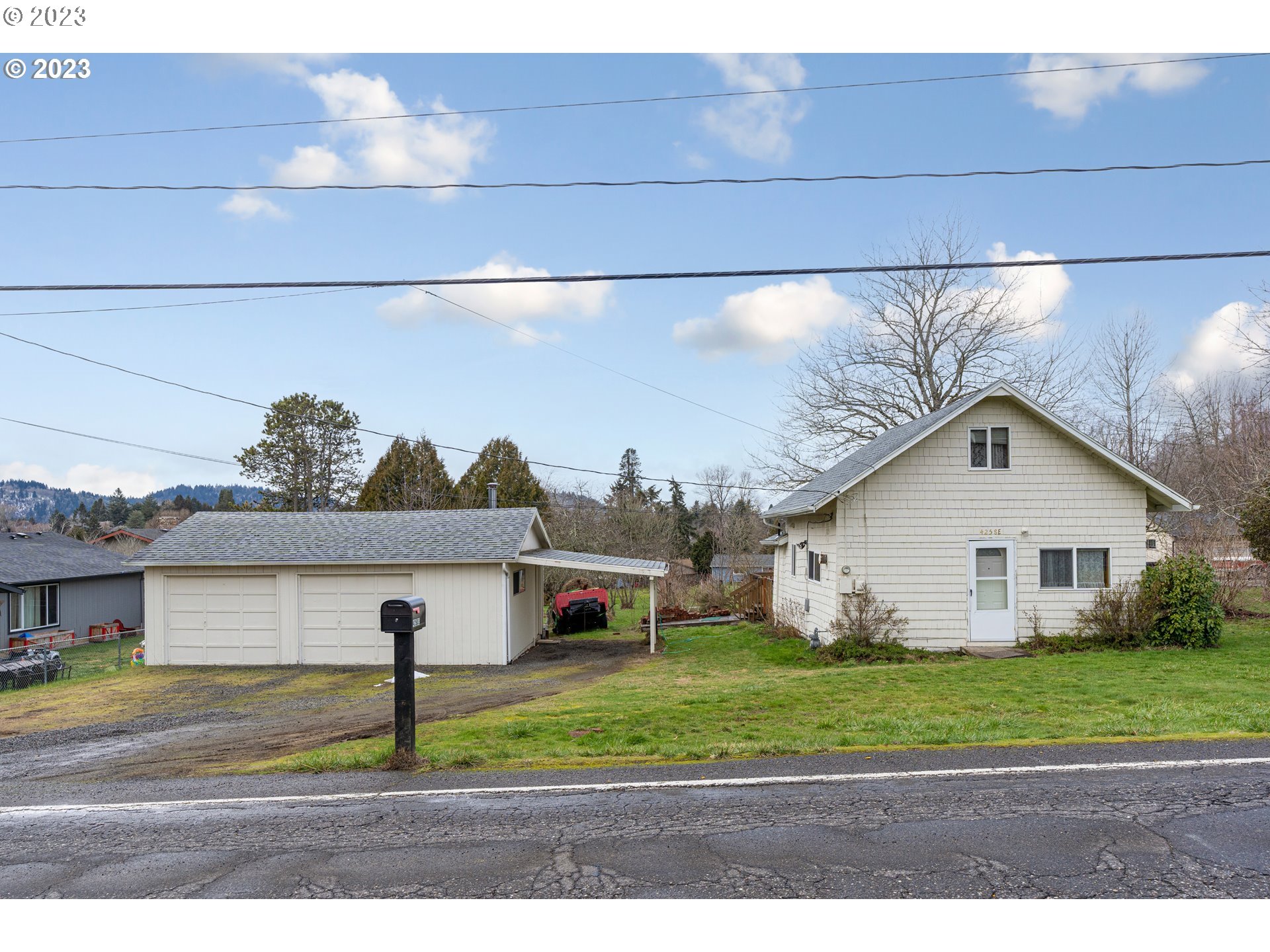 425 Southeast Williams Road Gresham, OR 97080 - Photo 3 of 30 a view of a yard and front view of a house
