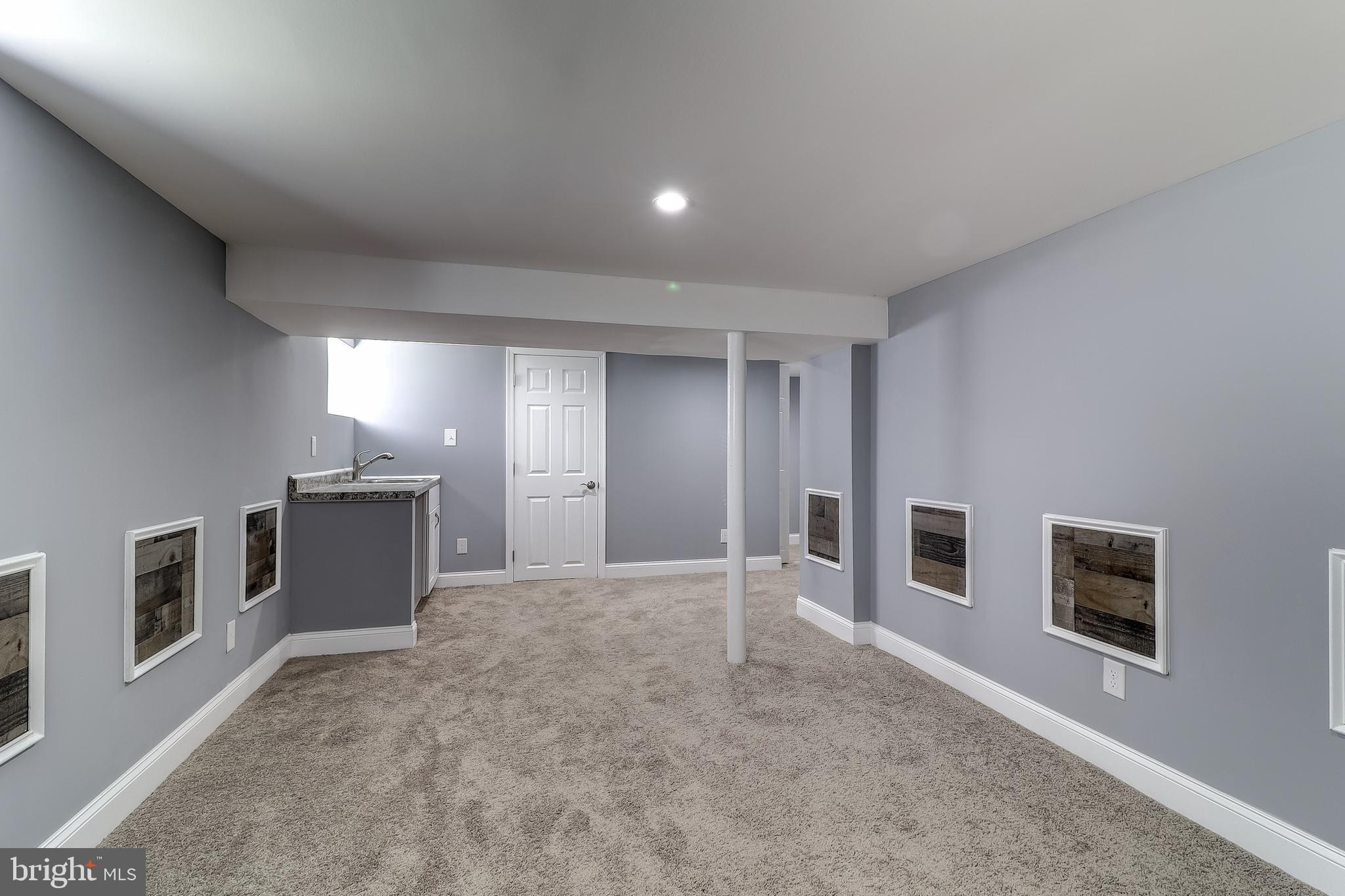 2004 Oakland Road Baltimore, MD 21220 - Photo 31 of 48 Lower Level Family Room with New Carpeting
