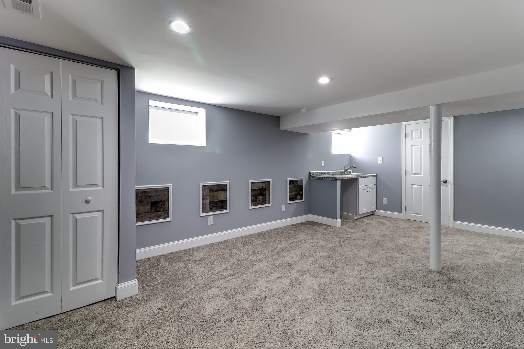 2004 Oakland Road Baltimore, MD 21220 - Photo 6 of 48 Lower level Family Room w/ Butlers Pantry