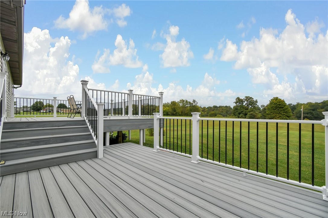 681 Rocky Point Road Fleming, OH 45729 - Photo 27 of 33 Wooden terrace with a lawn
