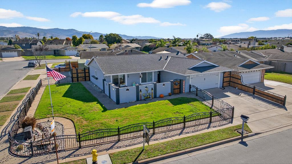 an aerial view of a house having swimming pool garden and patio