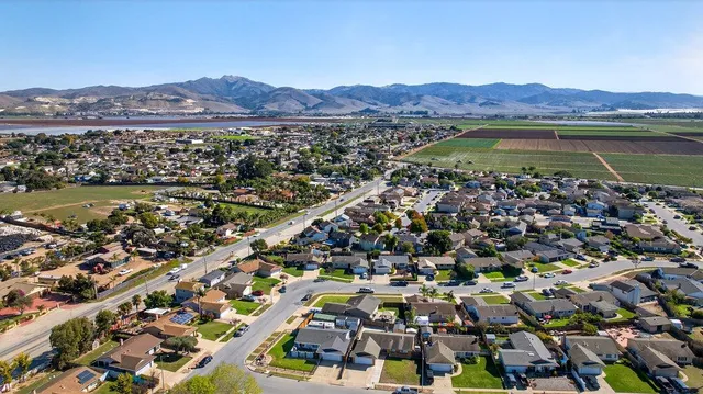 a view of a city with a lake
