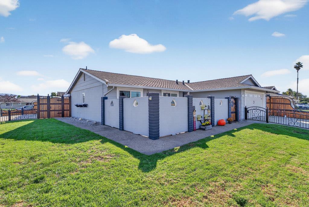 12932 Truman Street Salinas, CA 93906 - Photo 5 of 24 a view of a house with a yard and deck
