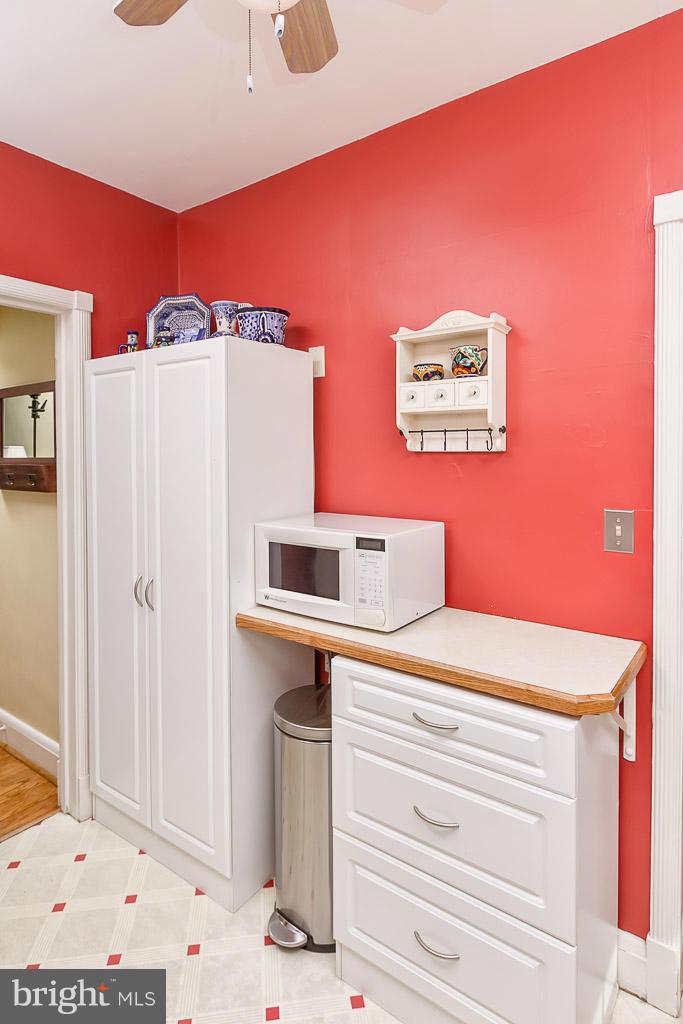 227 Dumbarton Road Baltimore, MD 21212 - Photo 14 of 30 a room with a bed and a refrigerator