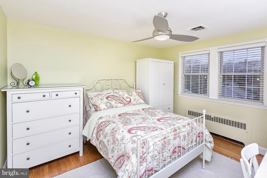 227 Dumbarton Road Baltimore, MD 21212 - Photo 17 of 30 a bedroom with a bed and a window