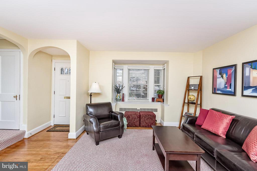 227 Dumbarton Road Baltimore, MD 21212 - Photo 7 of 30 a living room with furniture and a wooden floor