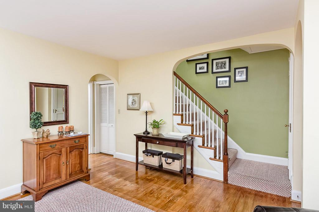 227 Dumbarton Road Baltimore, MD 21212 - Photo 8 of 30 a living room with furniture and a wooden floor