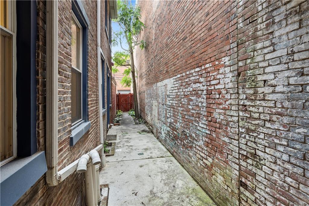 2217 Sarah Street Pittsburgh, PA 15203 - Photo 20 of 33 a view of a pathway both side of building