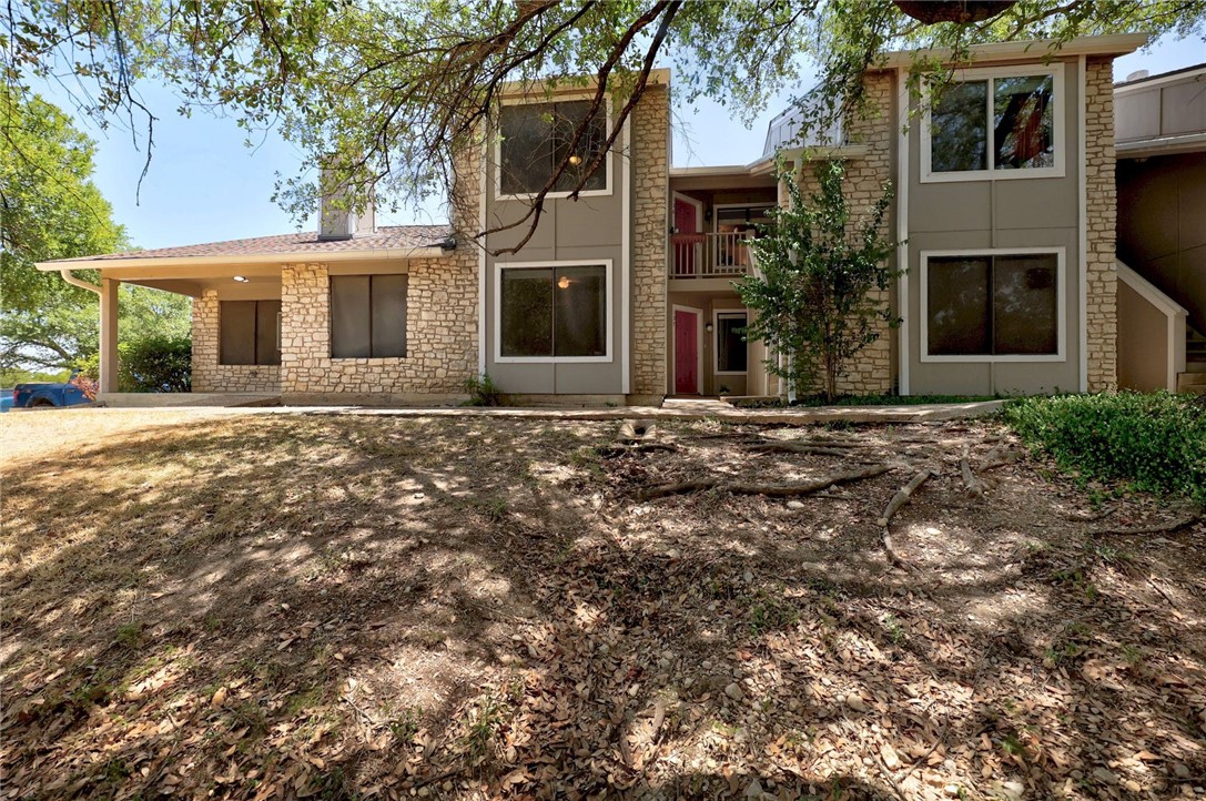 1740 Timber Ridge Road, Unit 137 Austin, TX 78741 - Photo 1 of 1 a view of a house with a tree in front
