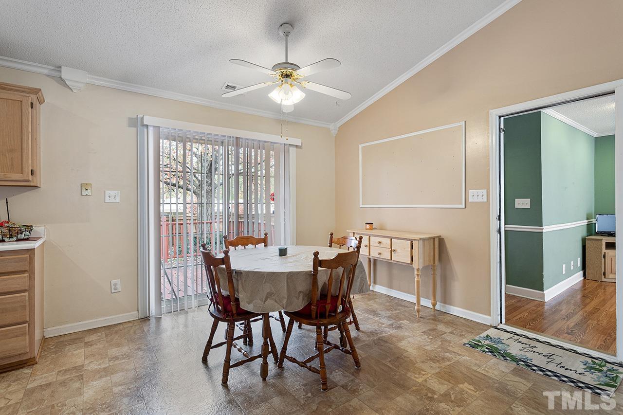 1406 Buckhorn Road Garner, NC 27529 - Photo 18 of 29 a dining room with furniture and window