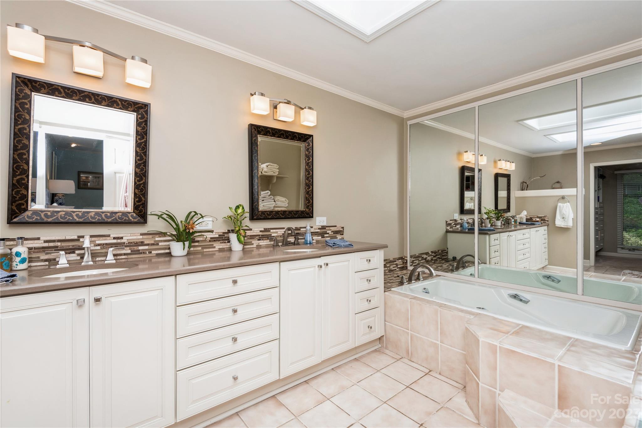 92 Fairway Ridge, Unit 8 Clover, SC 29710 - Photo 25 of 34 a bathroom with a granite countertop sink mirror and