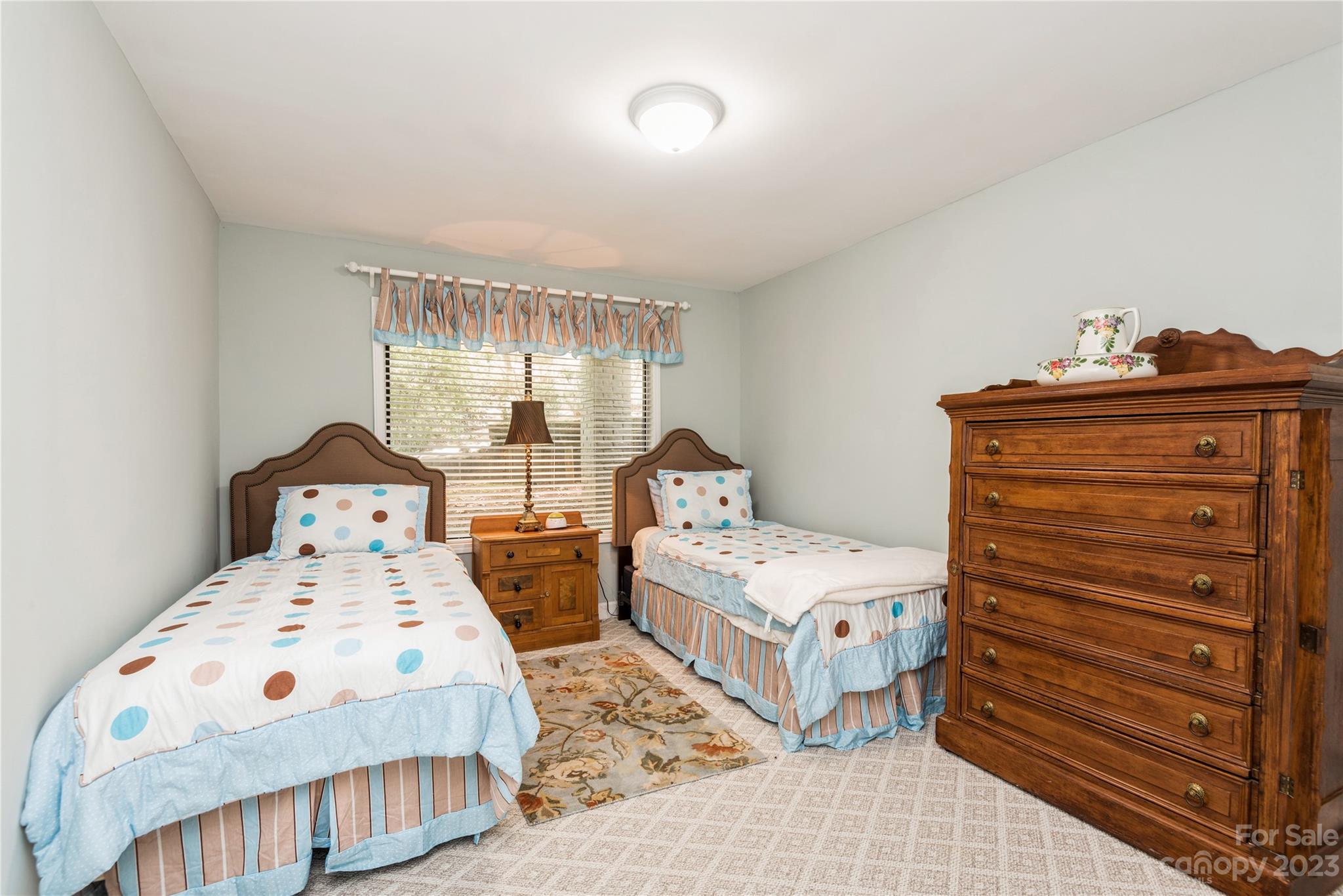 92 Fairway Ridge, Unit 8 Clover, SC 29710 - Photo 26 of 34 a bedroom with a bed and a large window