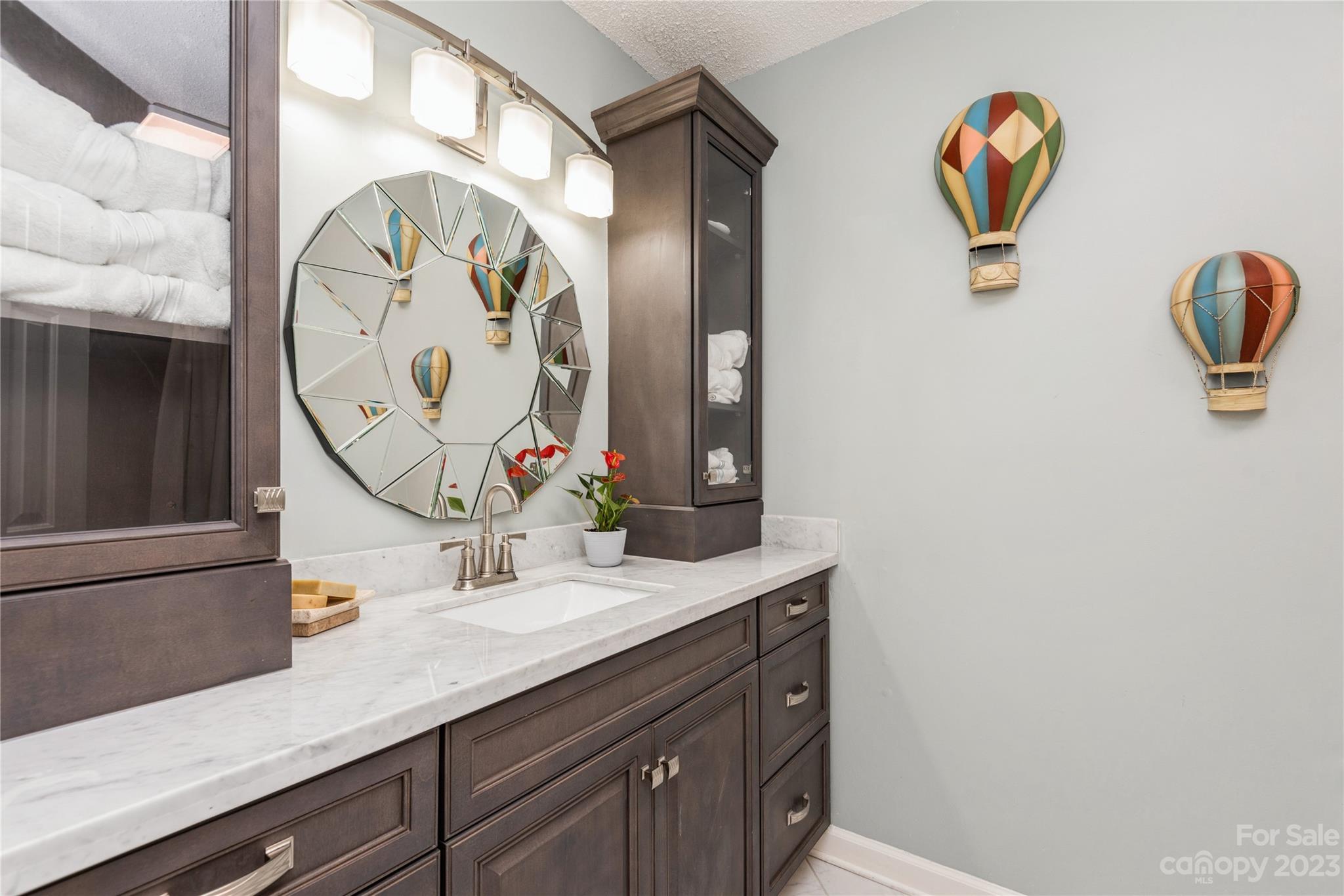 92 Fairway Ridge, Unit 8 Clover, SC 29710 - Photo 29 of 34 a bathroom with a sink and a mirror