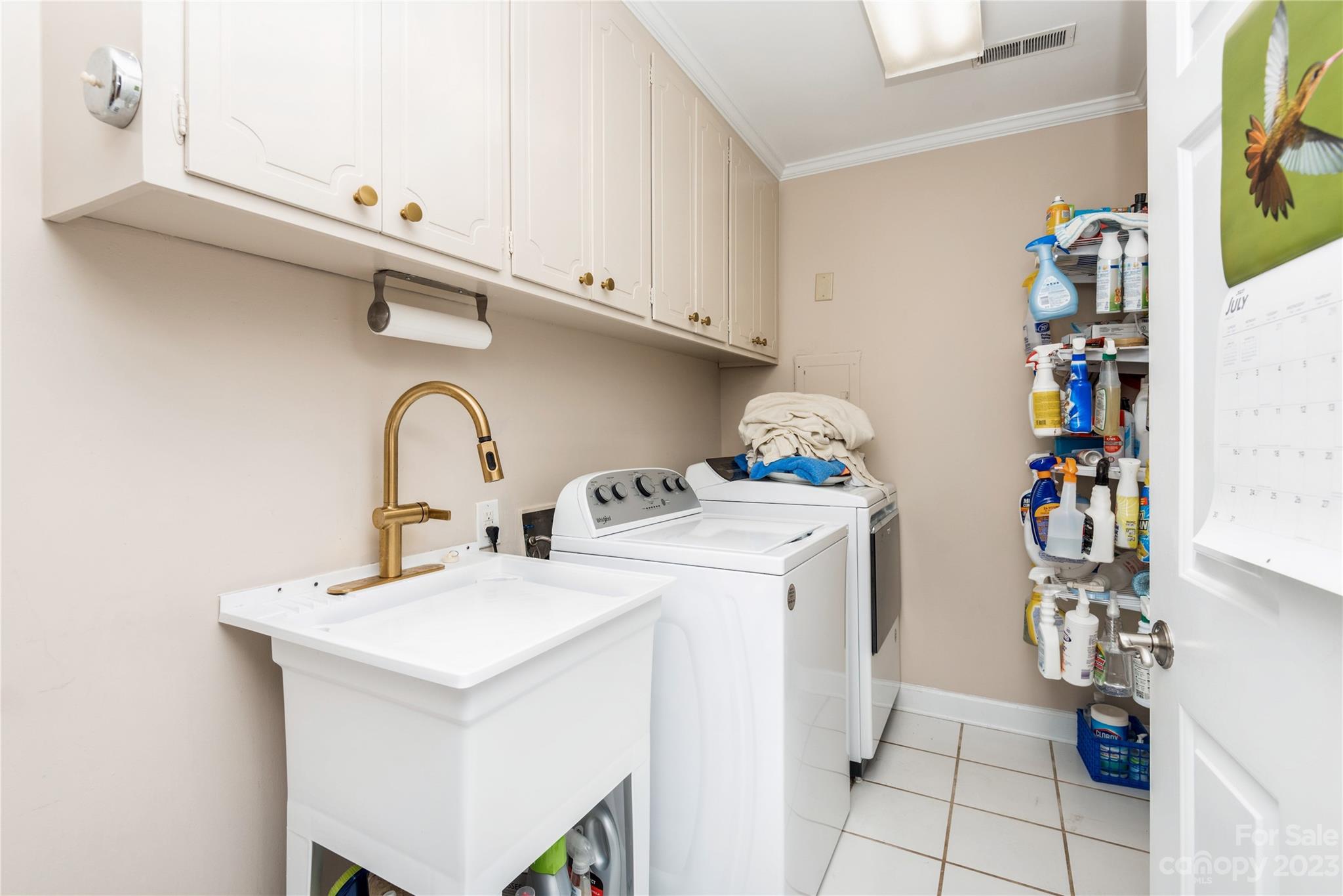 92 Fairway Ridge, Unit 8 Clover, SC 29710 - Photo 32 of 34 a utility room with sink dryer and washer