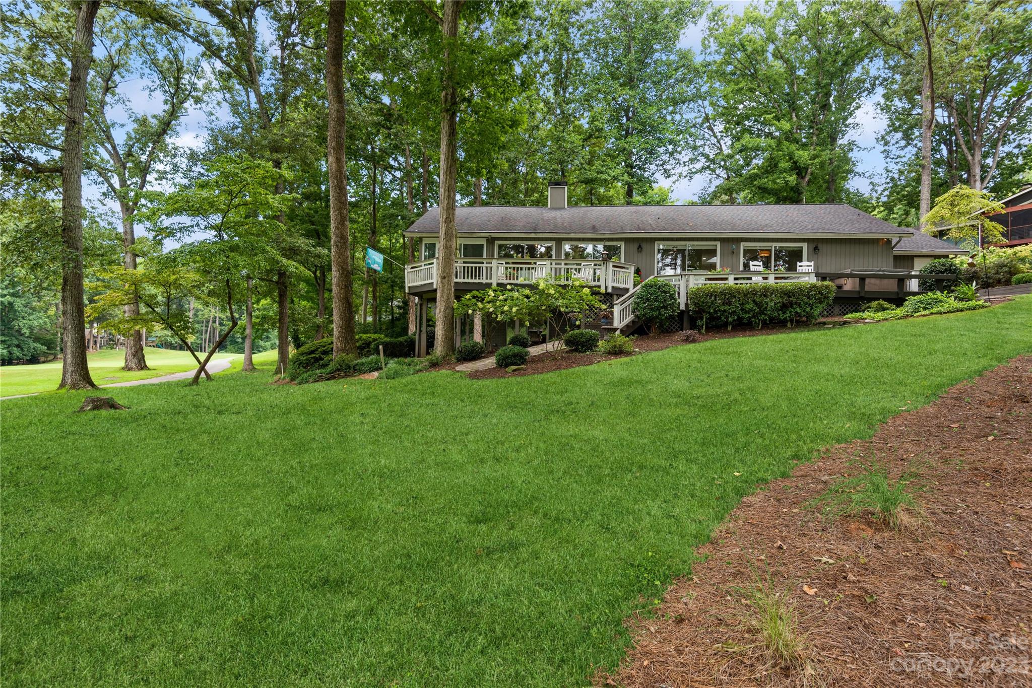 92 Fairway Ridge, Unit 8 Clover, SC 29710 - Photo 34 of 34 a view of house in front of a big yard with large trees
