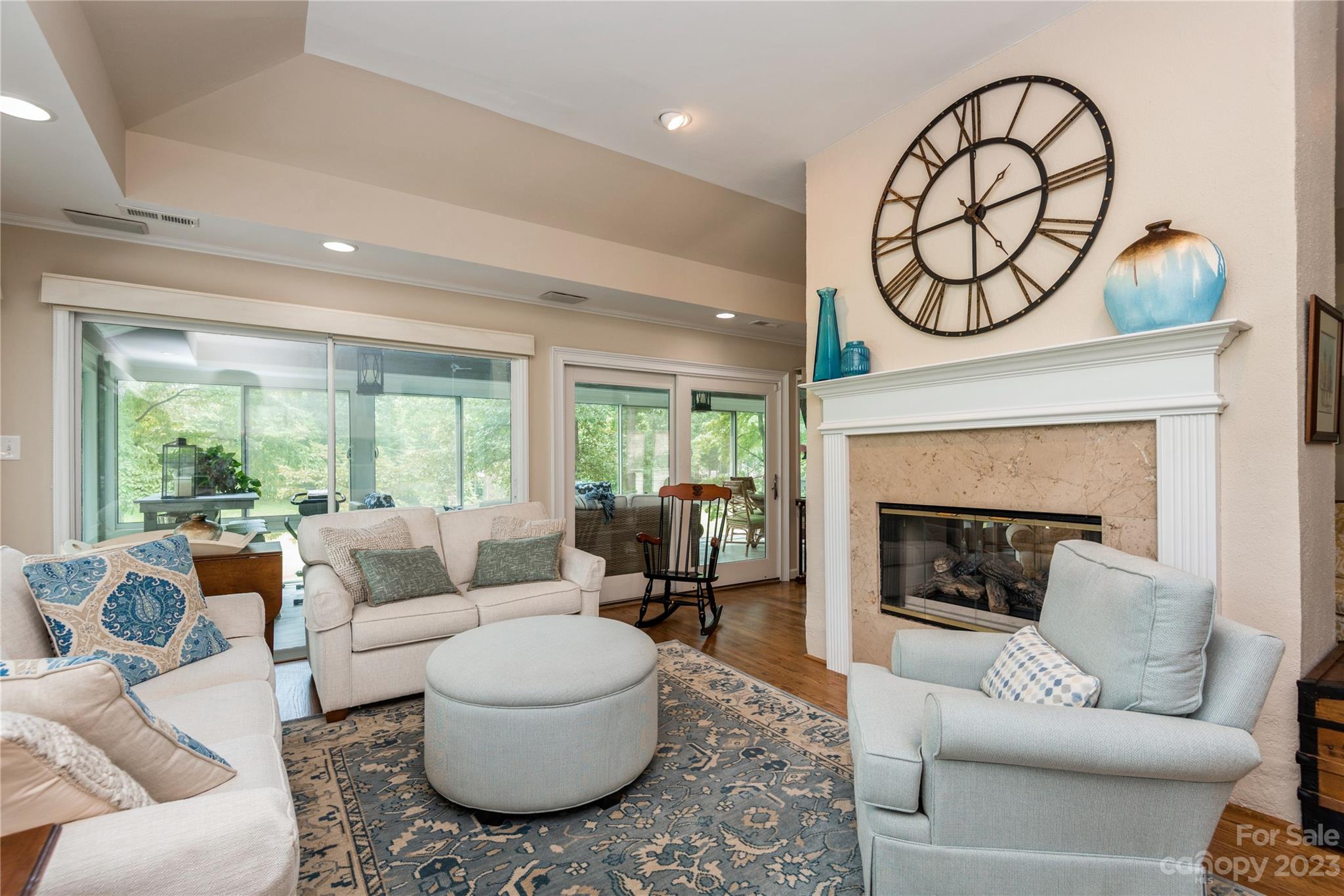 92 Fairway Ridge, Unit 8 Clover, SC 29710 - Photo 7 of 34 a living room with furniture a fireplace and a large window