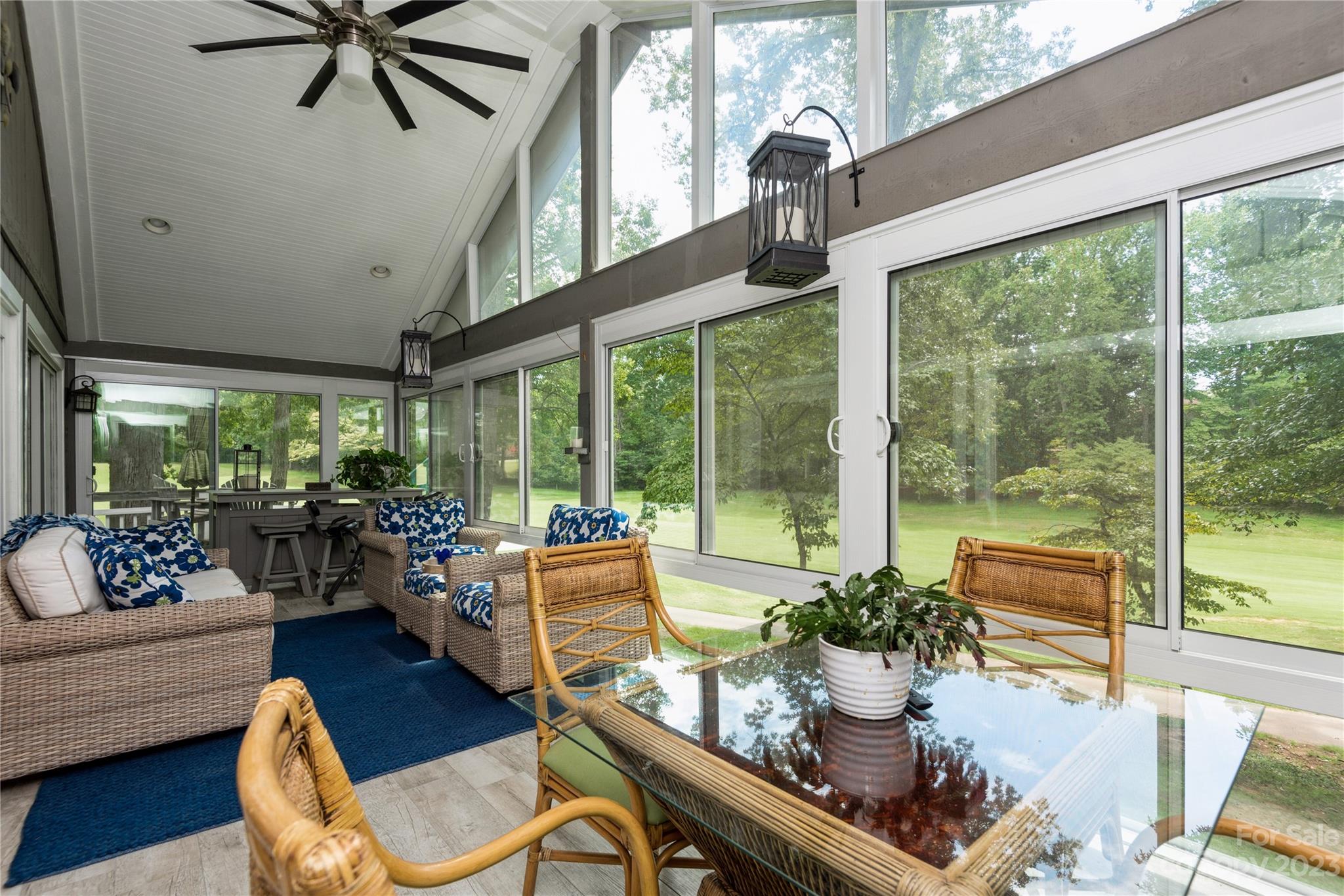 92 Fairway Ridge, Unit 8 Clover, SC 29710 - Photo 10 of 34 a living room with furniture and a floor to ceiling window