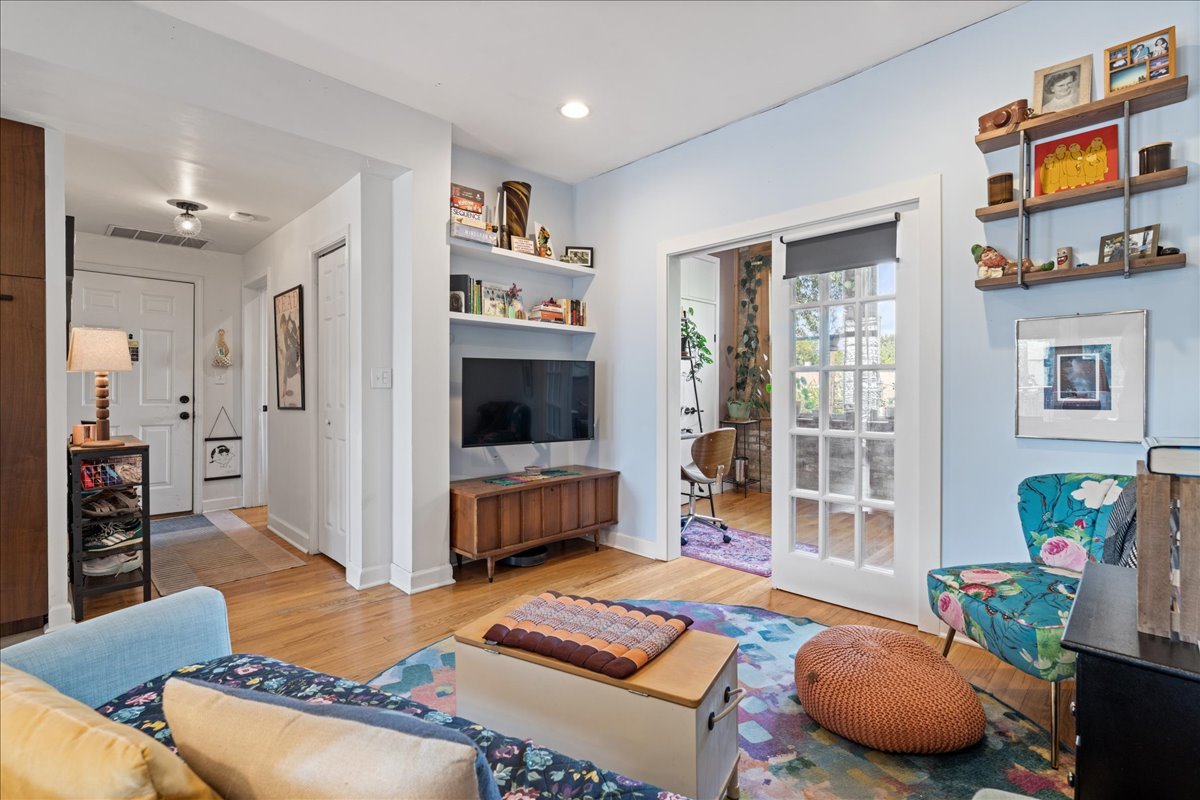 3107 West George Street, Unit 2 Chicago, IL 60618 - Photo 2 of 17 a living room with furniture and a flat screen tv