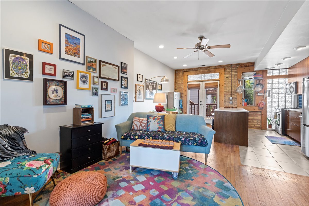 3107 West George Street, Unit 2 Chicago, IL 60618 - Photo 4 of 17 a living room with furniture and wooden floor