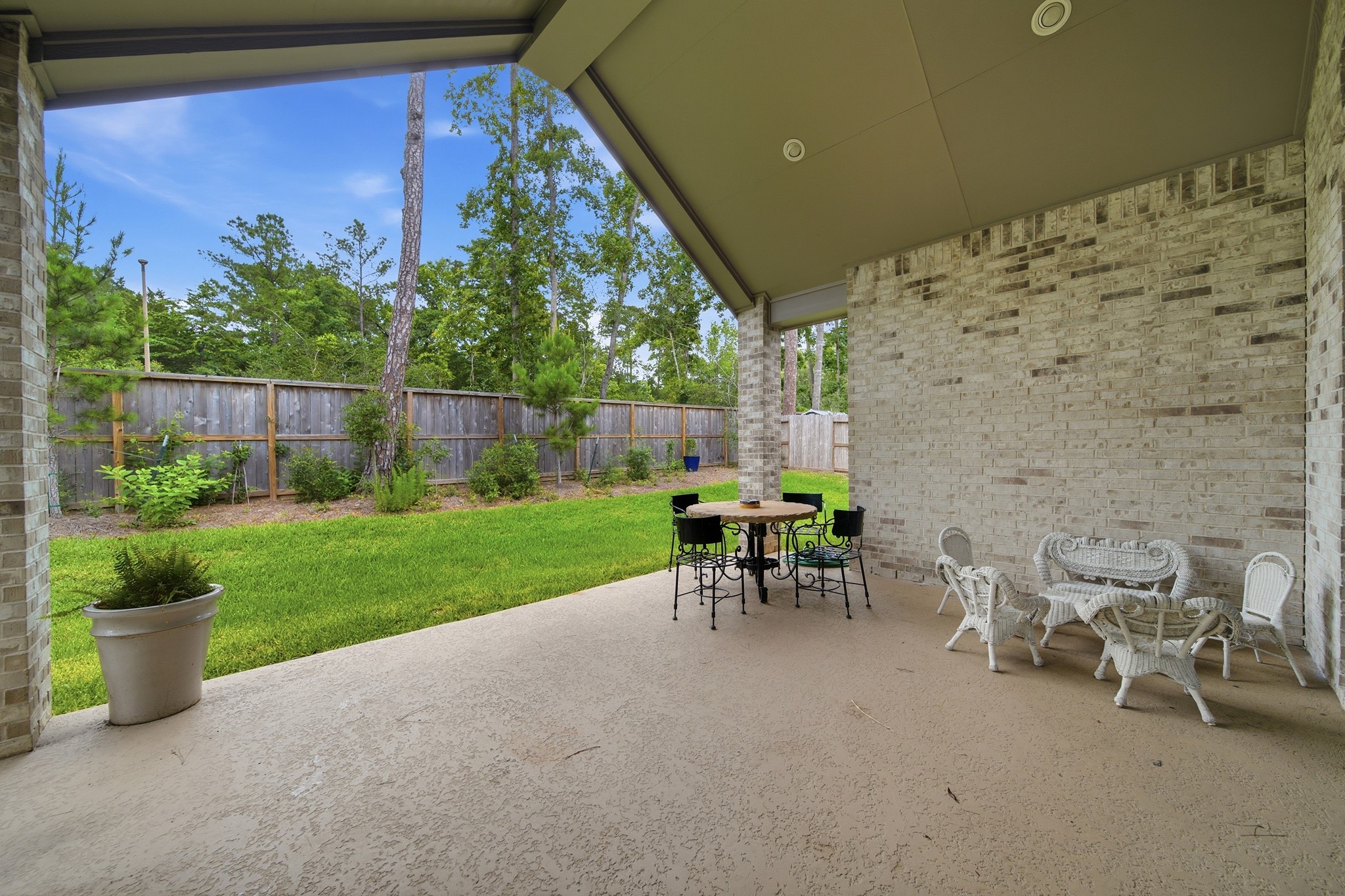 218 Wooded Rill Court Conroe, TX 77318 - Photo 41 of 50 Covered Outdoor Patio