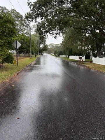 a view of road with trees