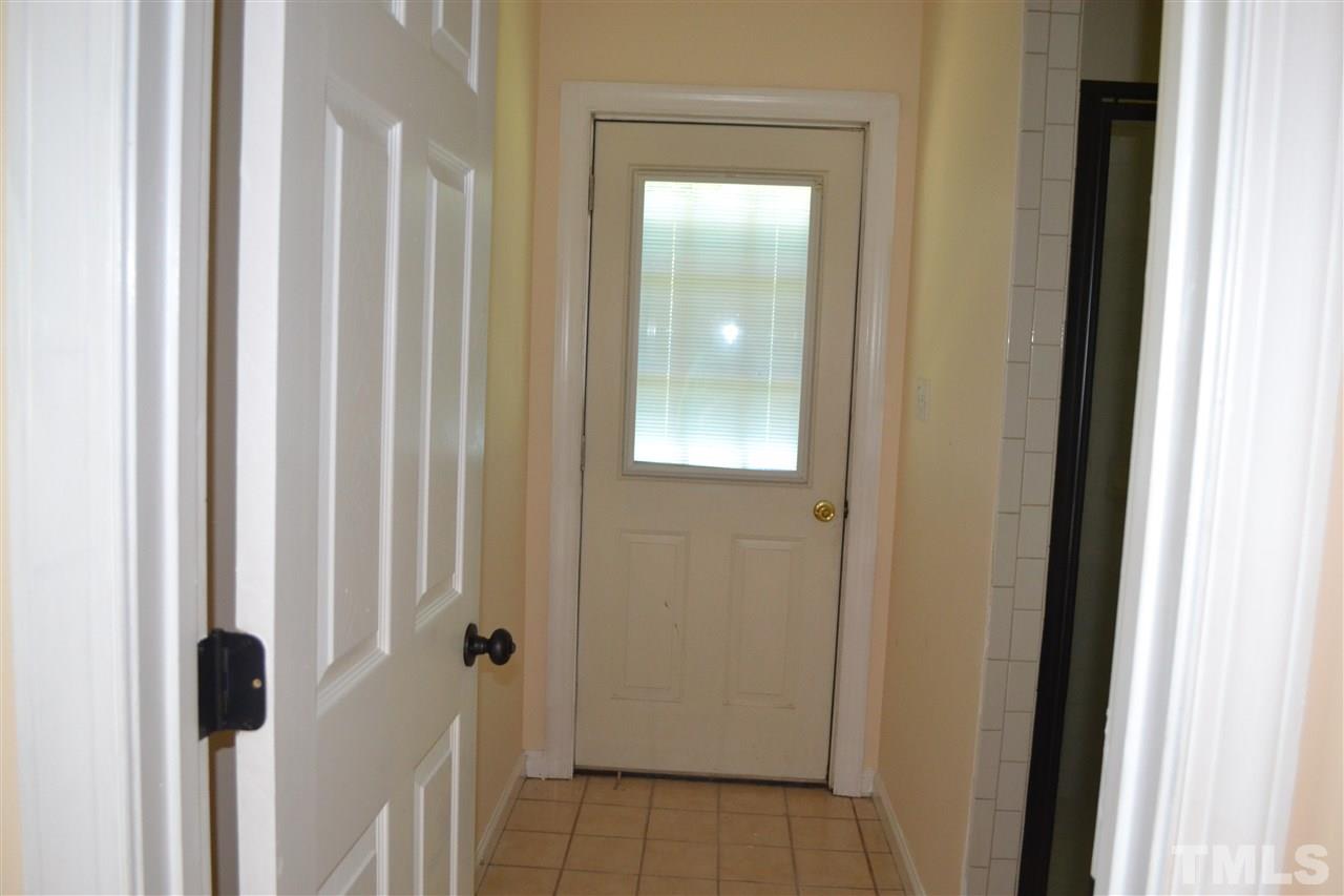 4623 Bragg Road Durham, NC 27704 - Photo 11 of 25 a view of a bathroom from a hallway