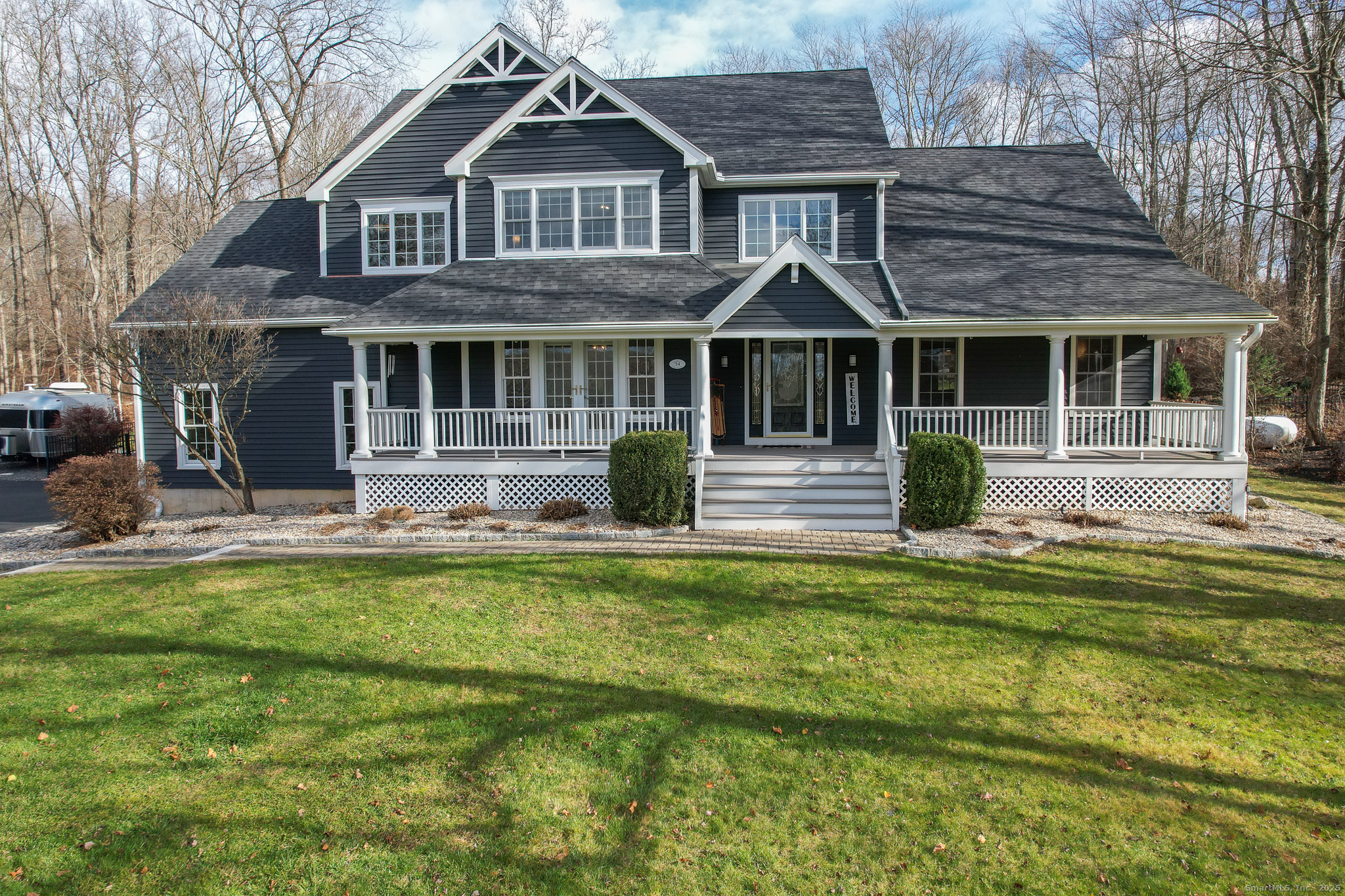 34 Yogananda Street Newtown, CT 06482 - Photo 1 of 1 a front view of a house with swimming pool