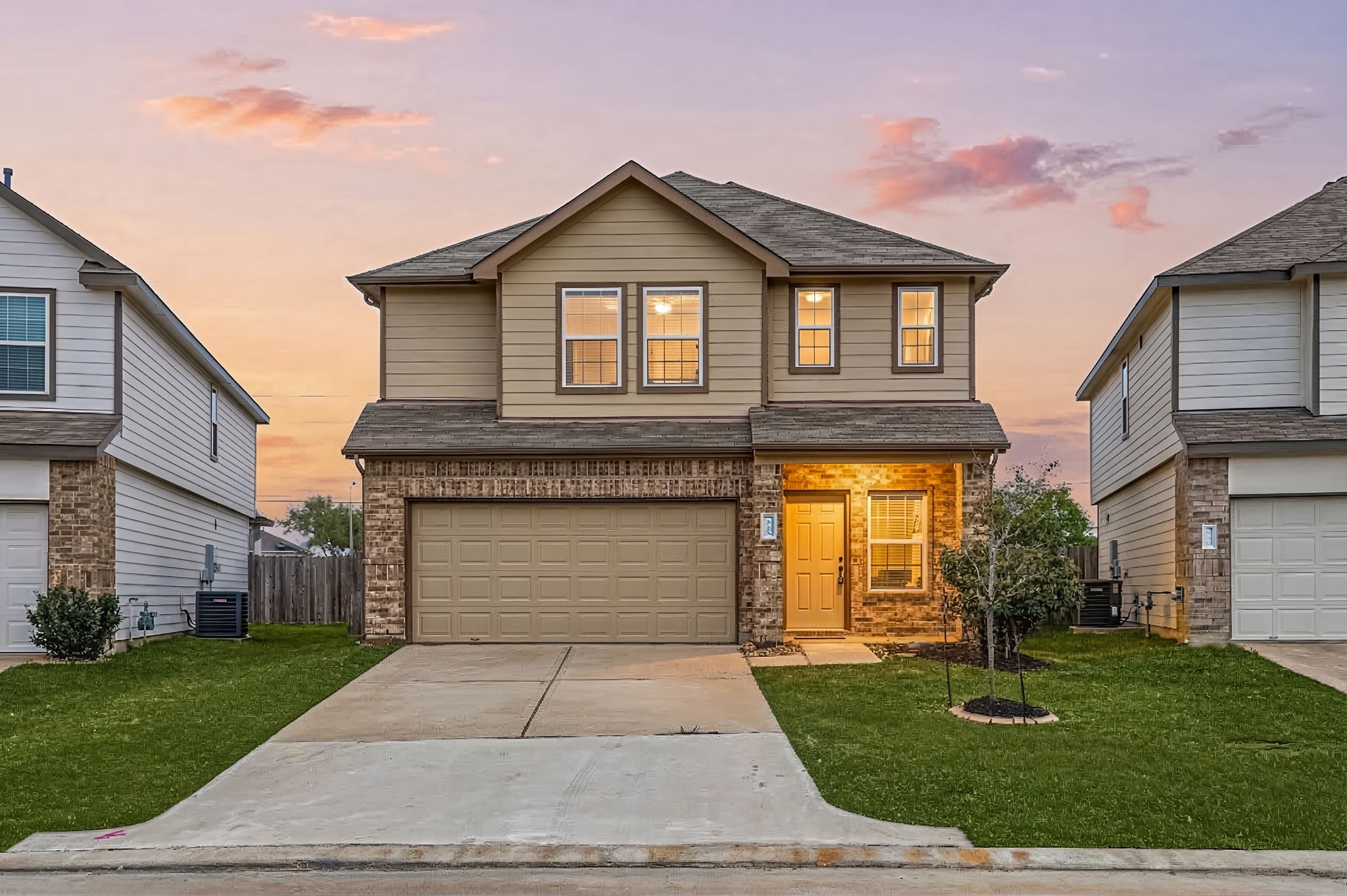18606 Lansdowne Stream Path Katy, TX 77449 - Photo 2 of 39 a front view of a house with garden