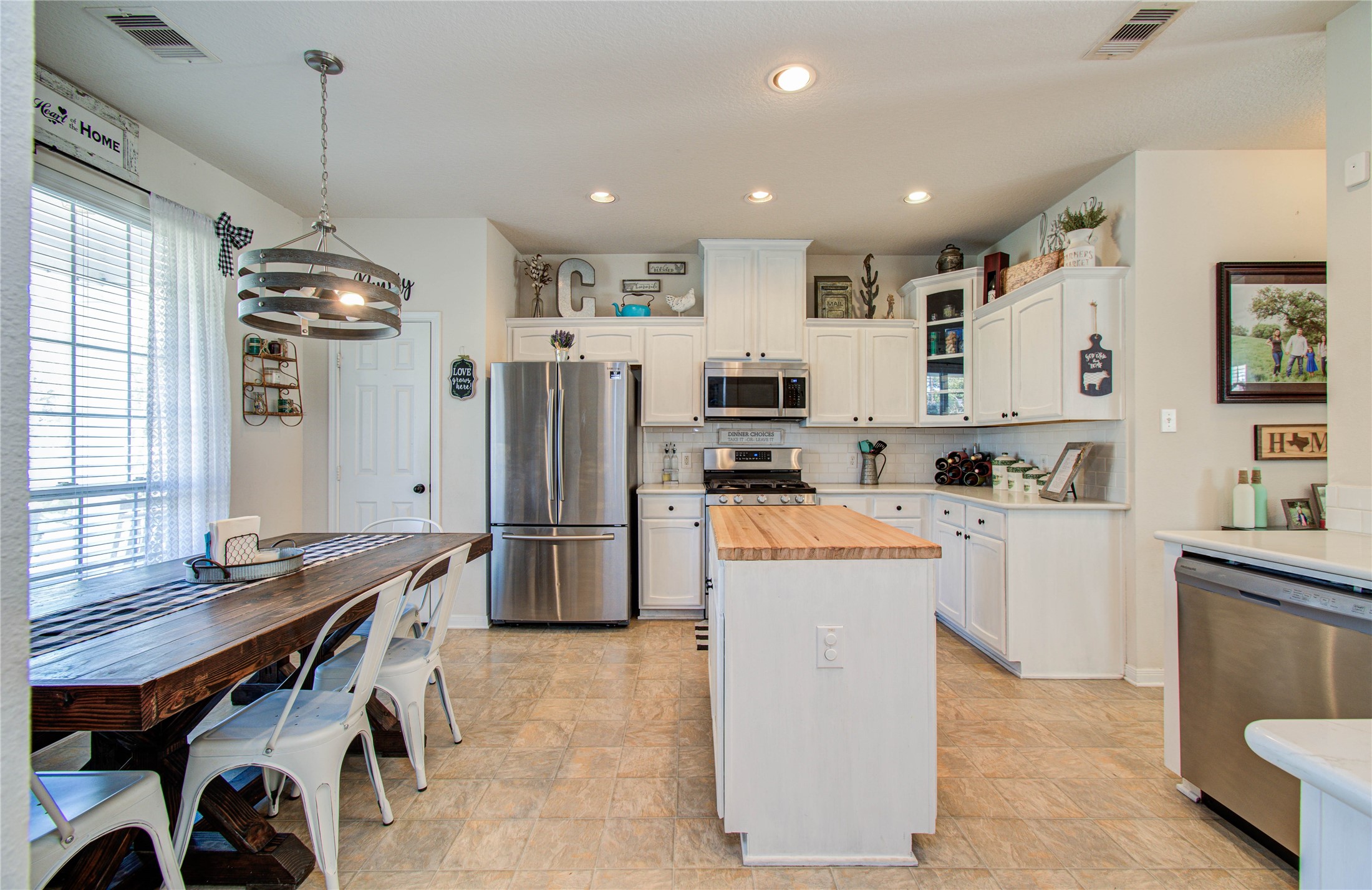 1779 County Road 151 Columbus, TX 78934 - Photo 11 of 47 a kitchen with refrigerator and cabinets