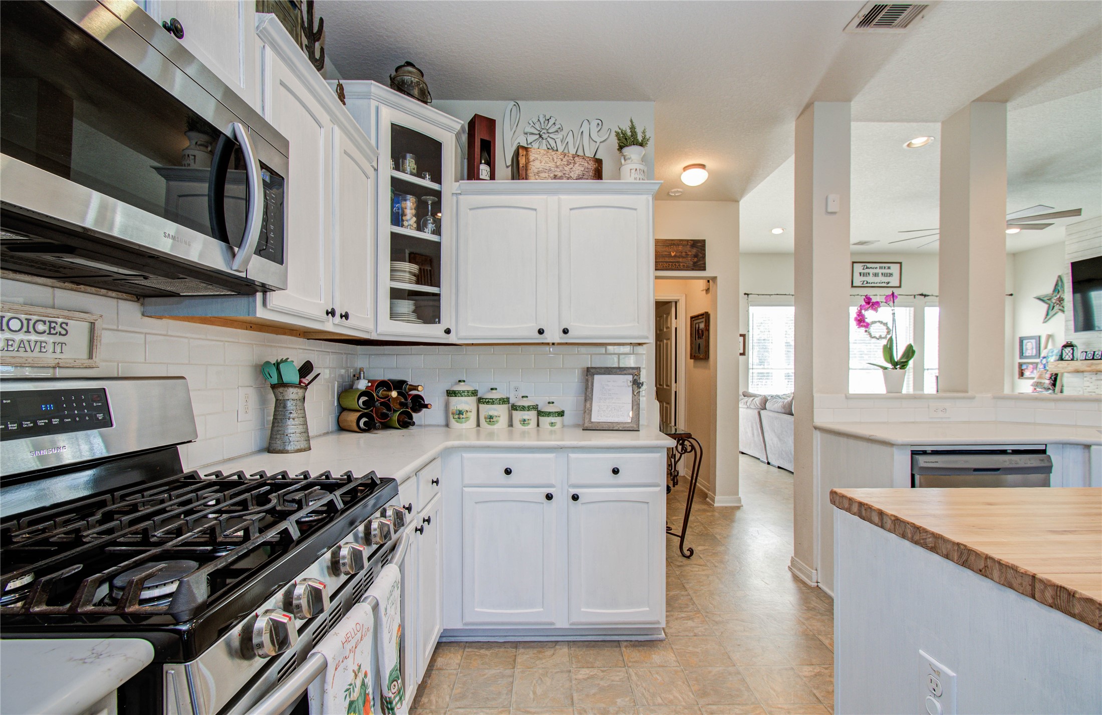 1779 County Road 151 Columbus, TX 78934 - Photo 13 of 47 a kitchen with stainless steel appliances granite countertop a stove and cabinets