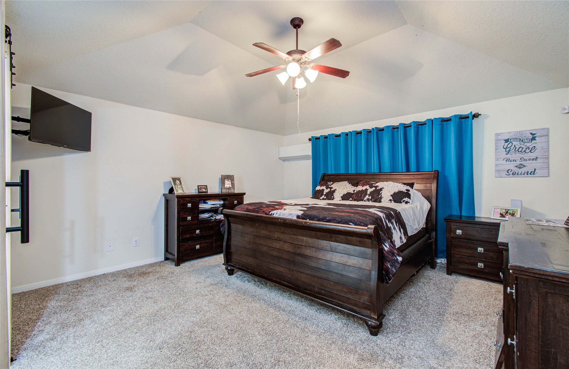 1779 County Road 151 Columbus, TX 78934 - Photo 14 of 47 a bed room with a bed and a chandelier