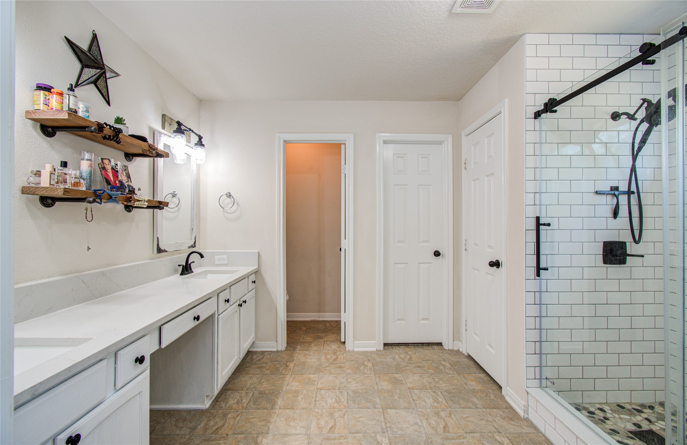 1779 County Road 151 Columbus, TX 78934 - Photo 16 of 47 a bathroom with a sink and a mirror