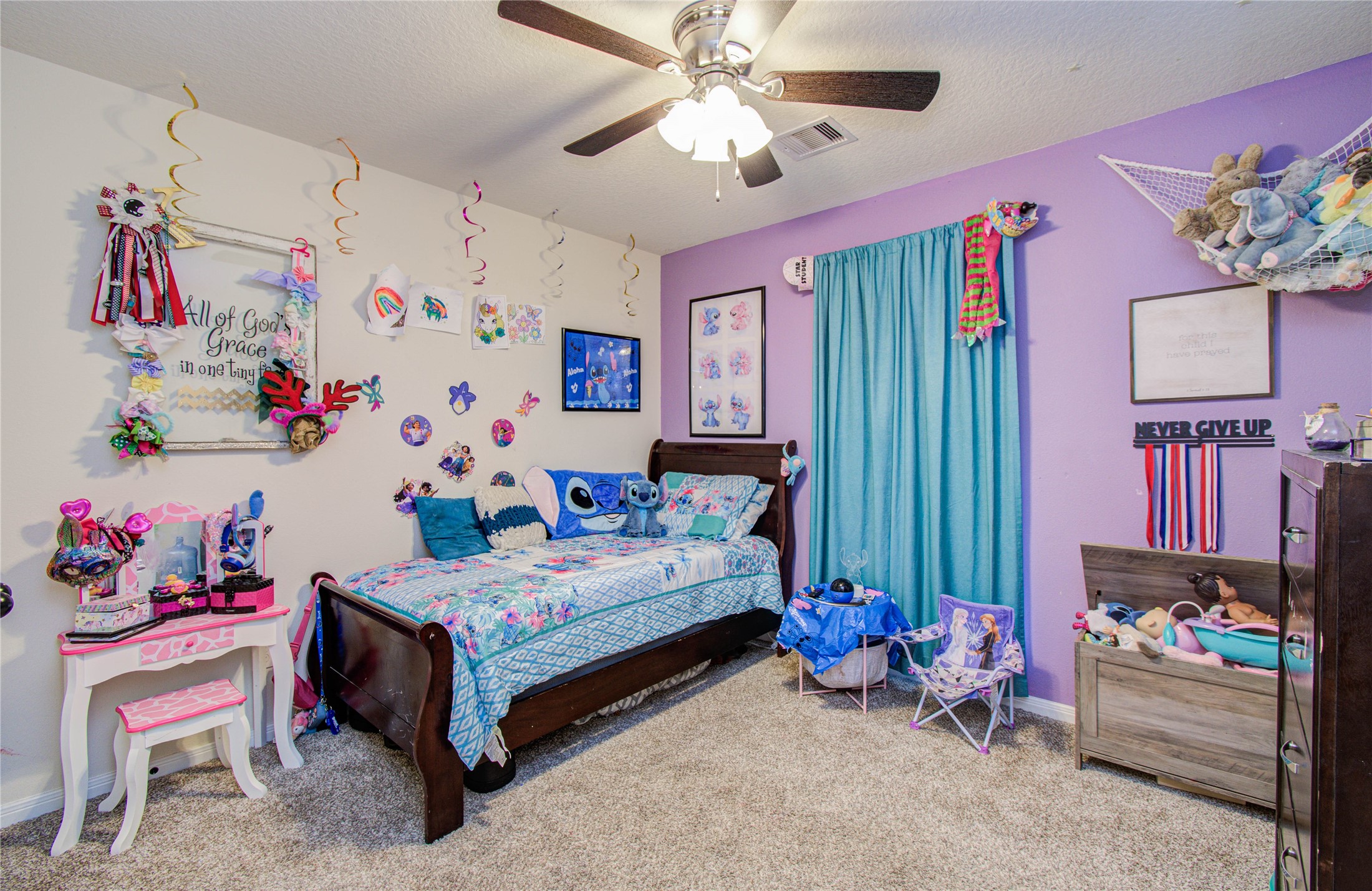 1779 County Road 151 Columbus, TX 78934 - Photo 19 of 47 a bedroom with a bed and a chandelier