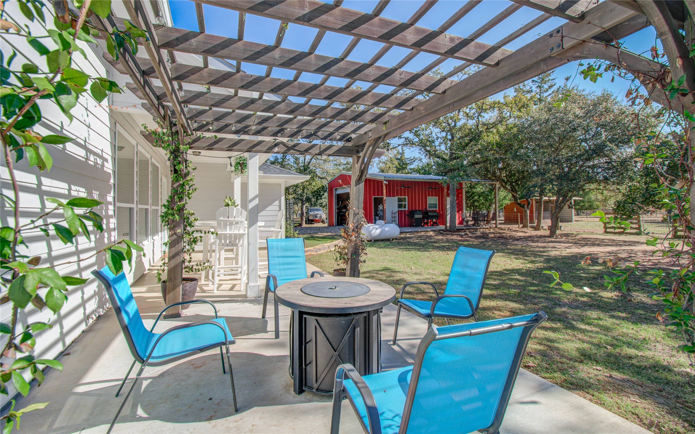 1779 County Road 151 Columbus, TX 78934 - Photo 26 of 47 a view of a chairs and table in the patio