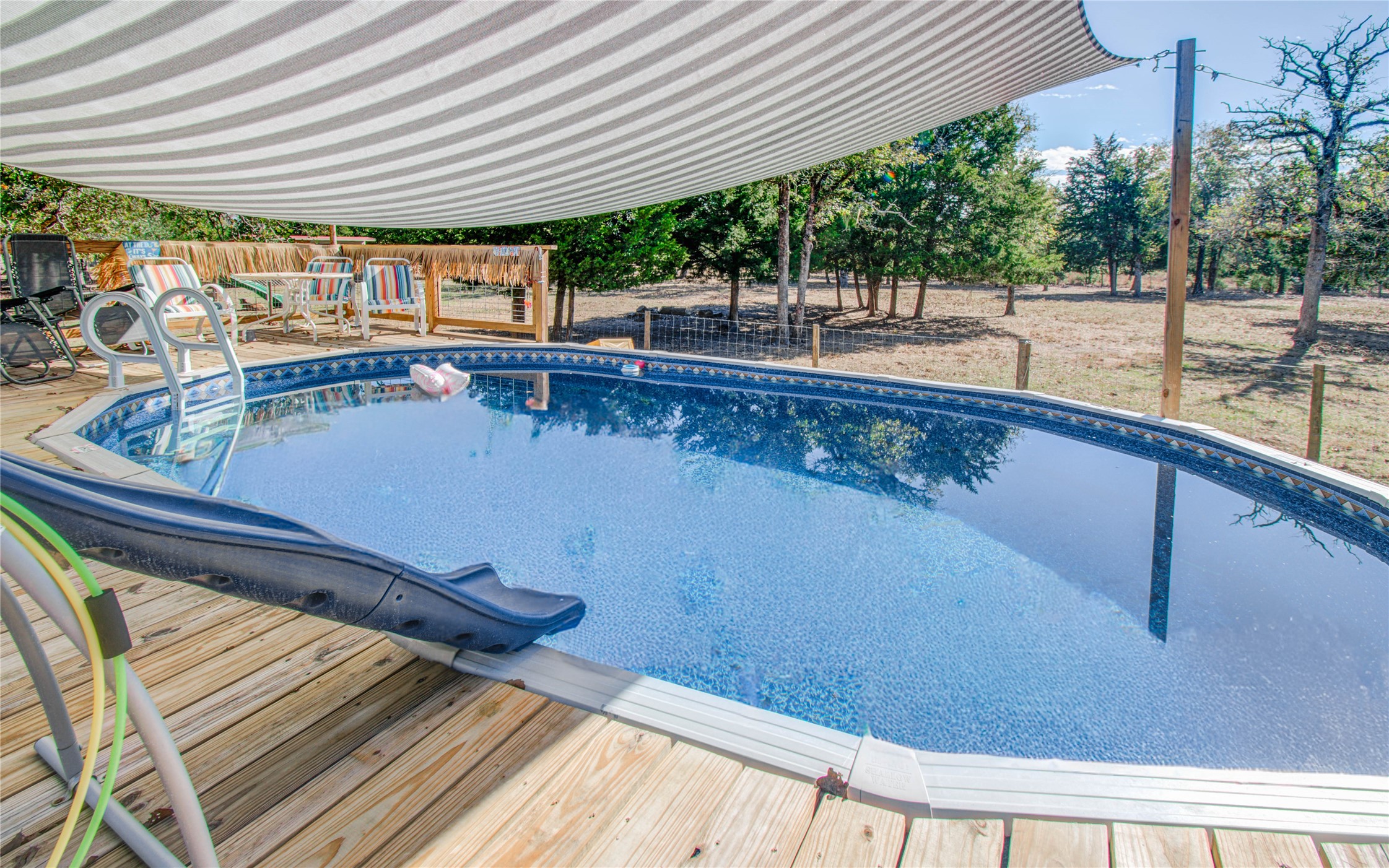 1779 County Road 151 Columbus, TX 78934 - Photo 28 of 47 a view of a swimming pool with a patio