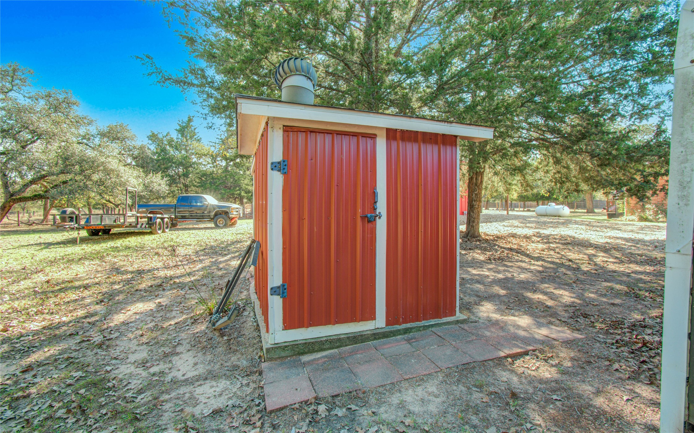 1779 County Road 151 Columbus, TX 78934 - Photo 42 of 47 a view of a backyard with a trees