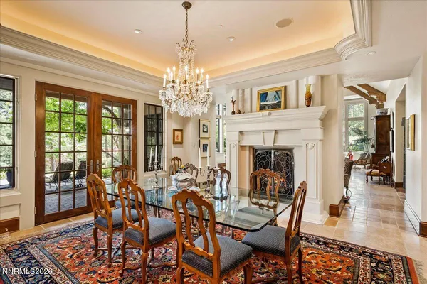 a kitchen with granite countertop stainless steel appliances a sink and cabinets