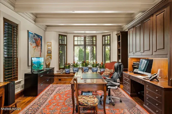 a bathroom with a mirror and a shower