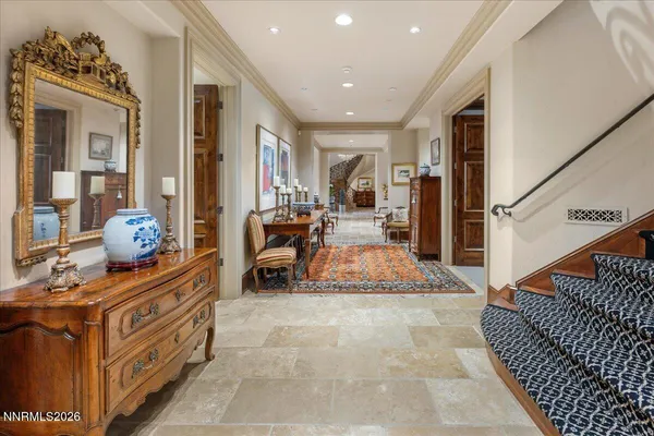 a spacious bathroom with a double vanity sink and a mirror