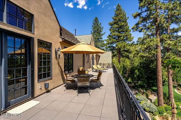a bathroom with a granite countertop sink mirror and double
